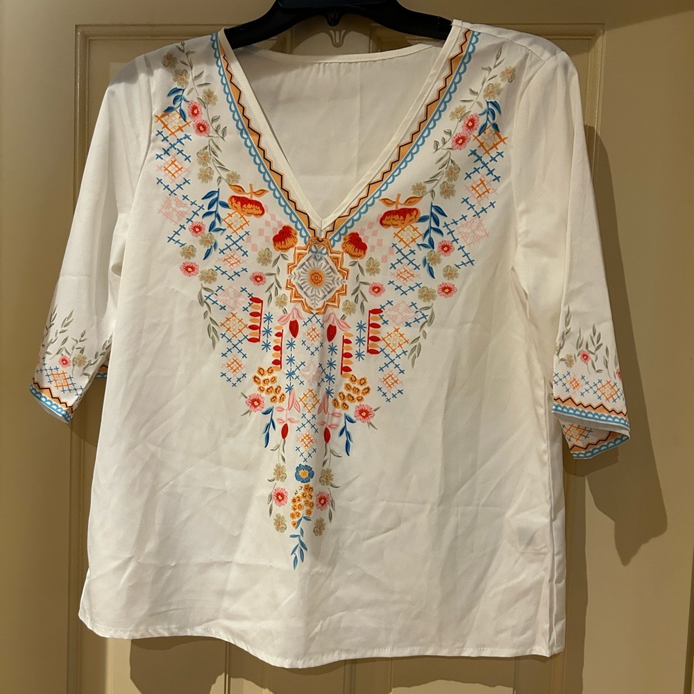 White rayon with printed design on front